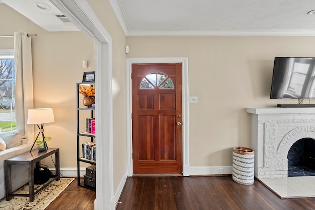 entrance foyer featuring dark wood finished floors and plenty of natural light