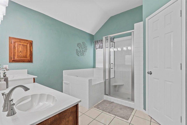 full bathroom with a stall shower, tile patterned flooring, a garden tub, and vaulted ceiling