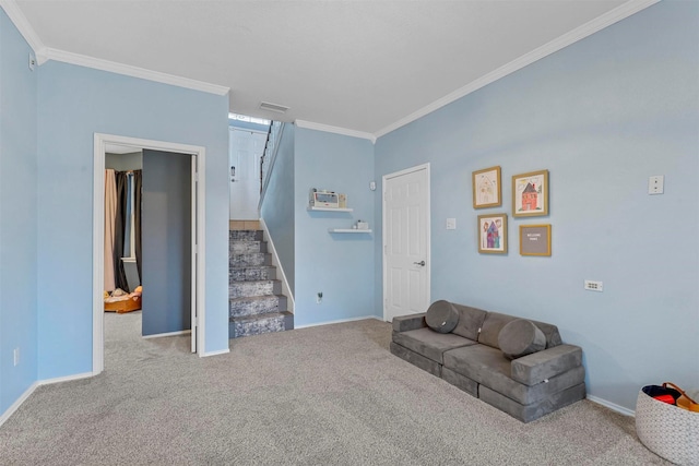 carpeted living room with stairs, baseboards, and crown molding