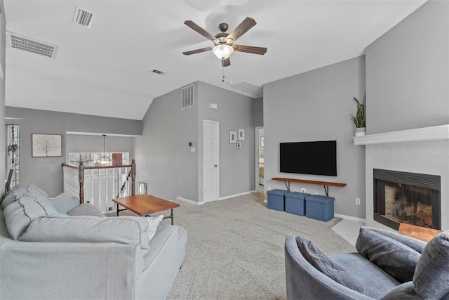 living area featuring visible vents, carpet, and attic access