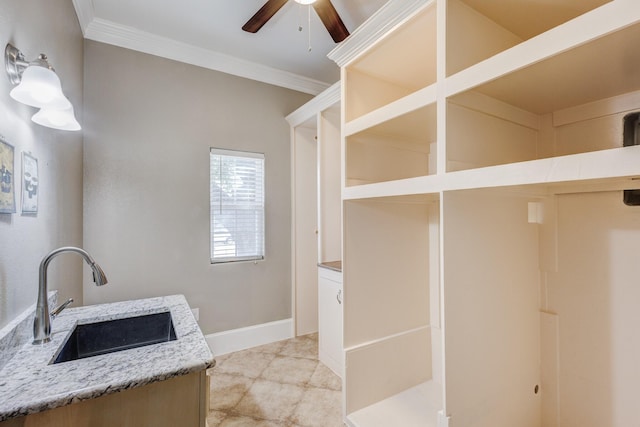 7101 Bridges Ave, Richland Hills, TX 76118 - interior space with ornamental molding, a sink, baseboards, and a ceiling fan