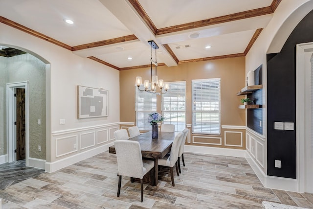 7101 Bridges Ave, Richland Hills, TX 76118 - dining area with arched walkways, a decorative wall, beamed ceiling, and wood tiled floor