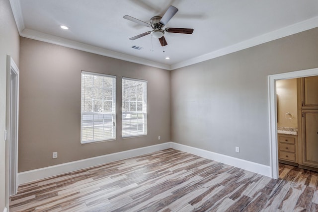 7101 Bridges Ave, Richland Hills, TX 76118 - unfurnished bedroom with light wood finished floors, baseboards, visible vents, connected bathroom, and crown molding