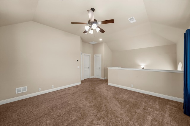 bonus room with lofted ceiling, carpet floors, baseboards, and visible vents