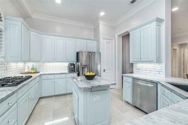 kitchen with visible vents, appliances with stainless steel finishes, light tile patterned floors, and light stone counters