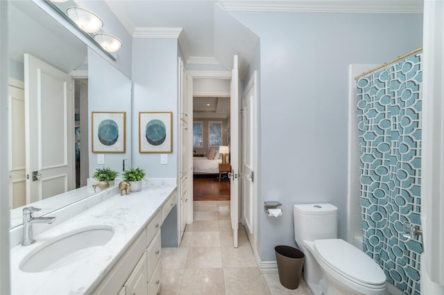 full bath featuring connected bathroom, toilet, tile patterned floors, crown molding, and vanity