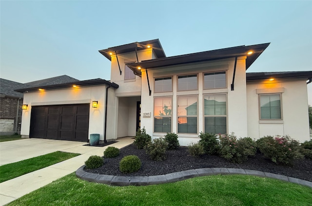 1305 Redbrick Ln, Northlake, TX 76247 - view of front facade featuring stucco siding, a garage, and driveway