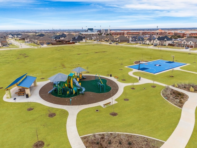 birds eye view of property with a residential view