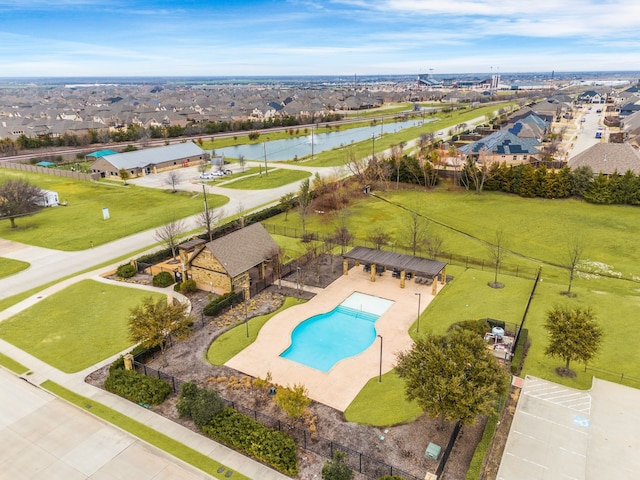 aerial view featuring a water view and a residential view