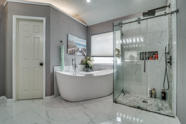 full bathroom with a soaking tub, a shower stall, marble finish floor, and a textured ceiling