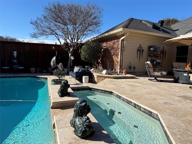 view of swimming pool with a fenced in pool, a patio, and fence