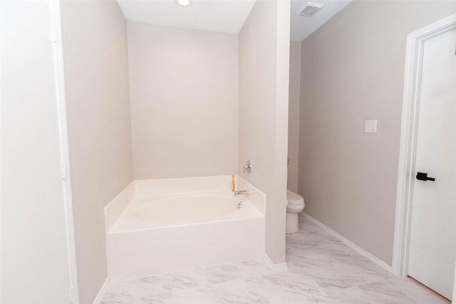 full bathroom featuring marble finish floor, a garden tub, visible vents, toilet, and baseboards