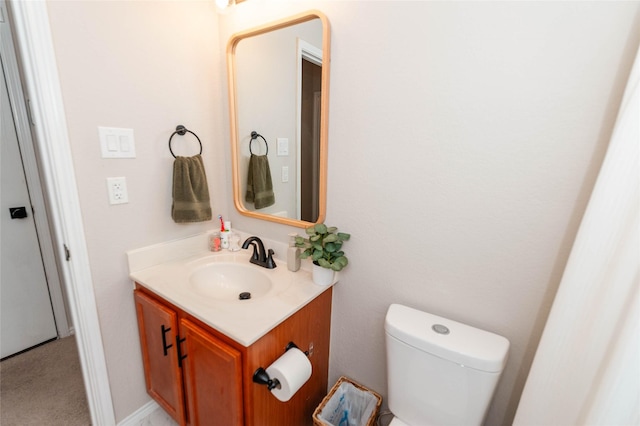 half bath with toilet and vanity