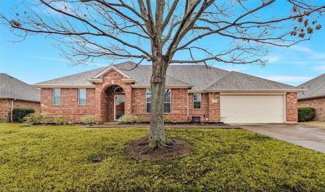 ranch-style house with a garage, driveway, a front lawn, and a shingled roof