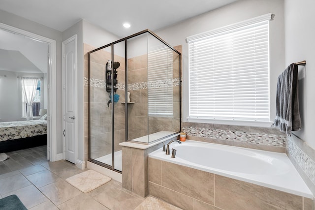 bathroom featuring recessed lighting, a stall shower, ensuite bath, tile patterned flooring, and a bath