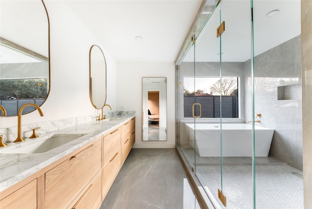 16912 Park Hill Dr, Dallas, TX 75248 - bathroom with a wealth of natural light, a sink, and double vanity