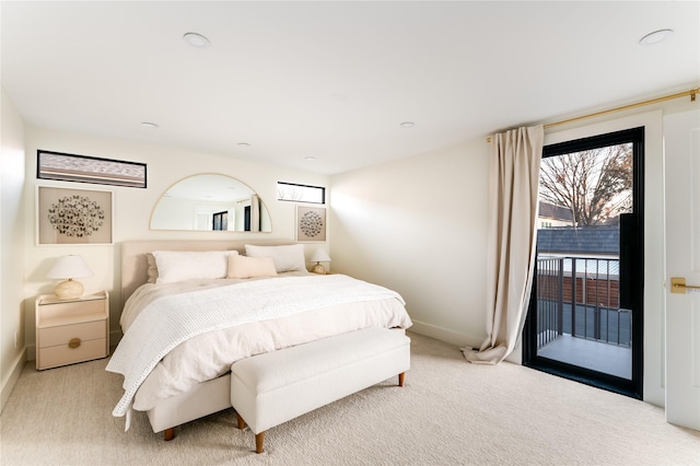 16912 Park Hill Dr, Dallas, TX 75248 - carpeted bedroom with multiple windows, baseboards, and access to outside