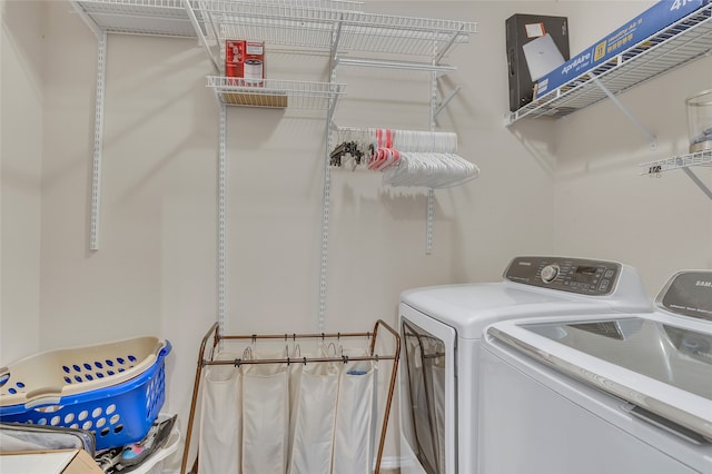 laundry room with laundry area and separate washer and dryer