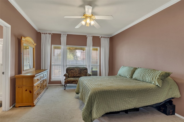 bedroom with light carpet, ceiling fan, ornamental molding, and baseboards