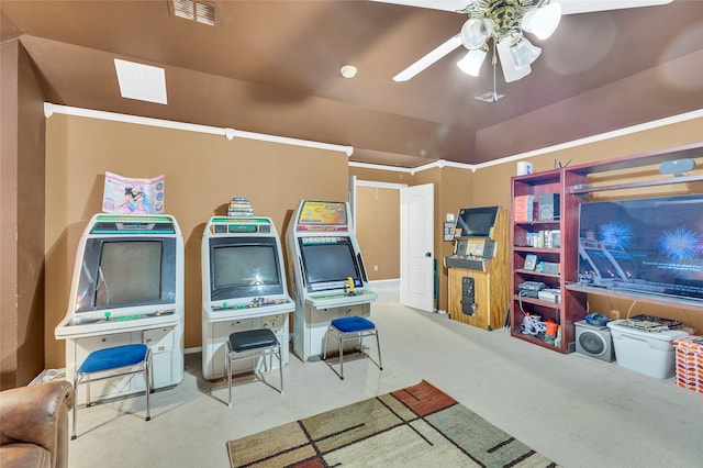 playroom featuring carpet floors, visible vents, and a ceiling fan