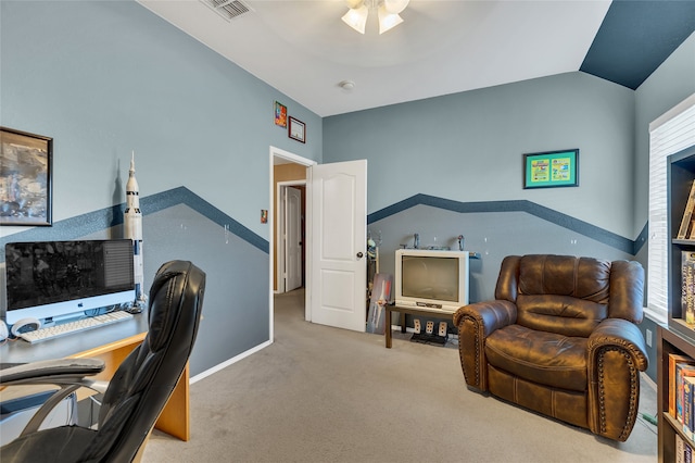 office with vaulted ceiling, light carpet, and visible vents