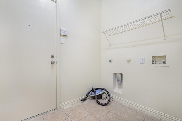 washroom featuring laundry area, hookup for a gas dryer, hookup for a washing machine, hookup for an electric dryer, and light tile patterned flooring