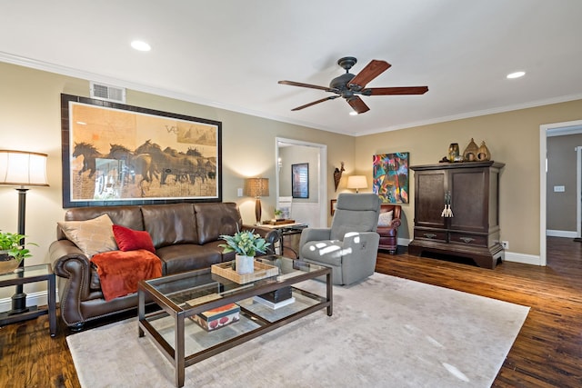 living room with baseboards, dark wood finished floors, ceiling fan, crown molding, and recessed lighting