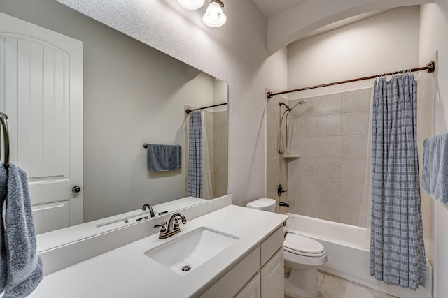 bathroom with toilet, vanity, shower / bath combination with curtain, and tile patterned floors