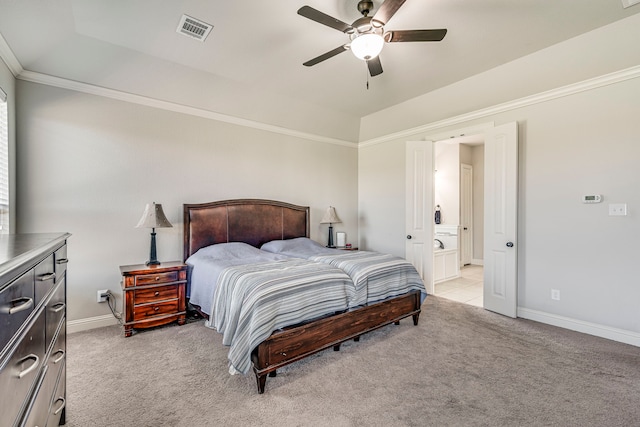 bedroom with baseboards, visible vents, and light colored carpet