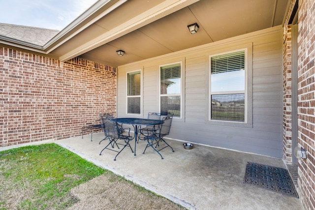 view of patio with outdoor dining space