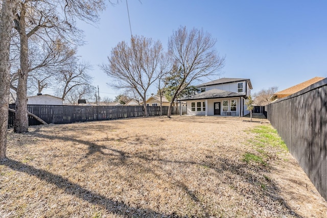 view of yard featuring a fenced backyard