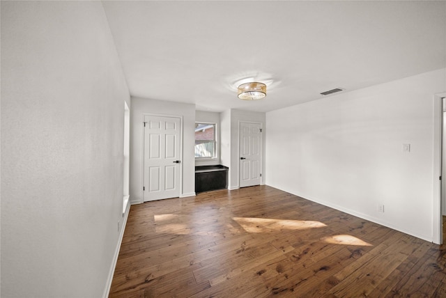 3829 Cloverdale Dr, Tyler, TX 75701 - unfurnished bedroom with baseboards and hardwood / wood-style flooring