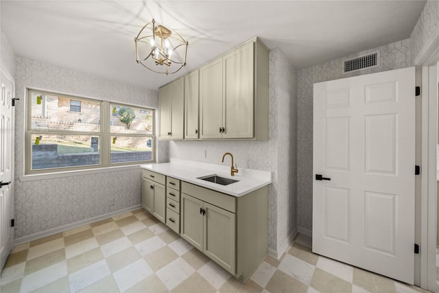 3829 Cloverdale Dr, Tyler, TX 75701 - washroom with a sink, a chandelier, baseboards, and light flooring