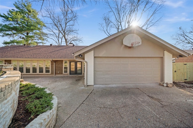3829 Cloverdale Dr, Tyler, TX 75701 - view of front of property with brick siding, driveway, a garage, and a shingled roof