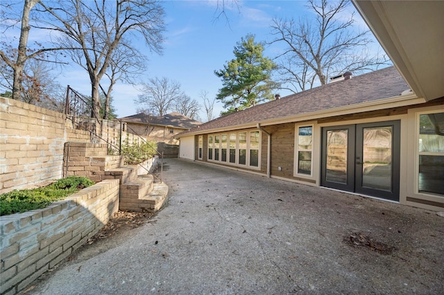 3829 Cloverdale Dr, Tyler, TX 75701 - view of patio / terrace with fence and french doors