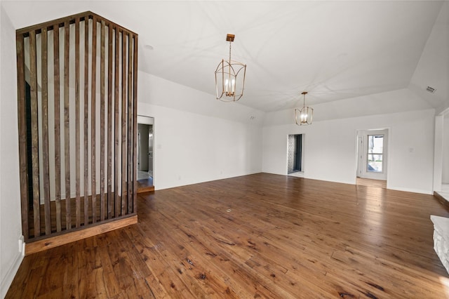 3829 Cloverdale Dr, Tyler, TX 75701 - spare room with a chandelier and hardwood / wood-style floors