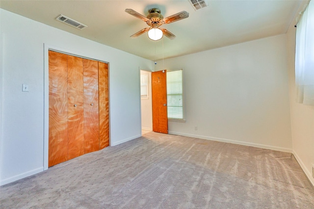 205 Bedford Ct E, Bedford, TX 76022 - unfurnished bedroom featuring ceiling fan, baseboards, visible vents, and carpet