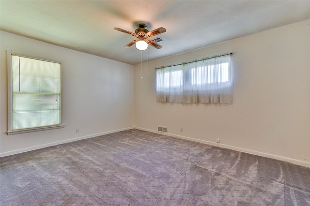 205 Bedford Ct E, Bedford, TX 76022 - carpeted empty room with baseboards, a ceiling fan, and visible vents