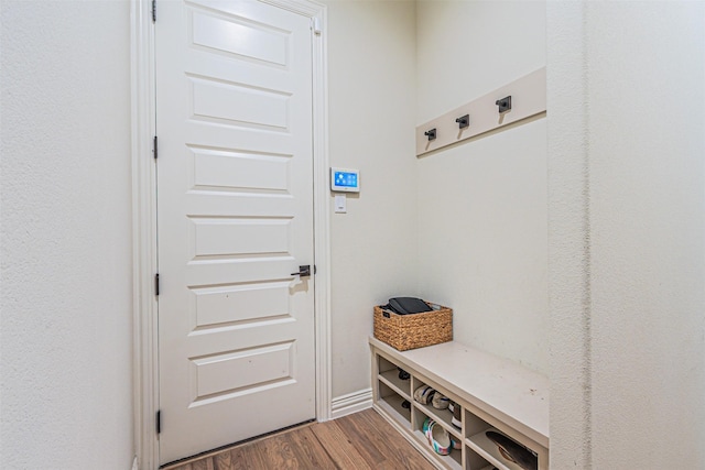 mudroom with wood finished floors