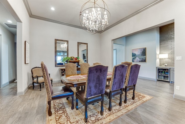 326 Prairie View Rd, Rockwall, TX 75087 - dining room featuring ornamental molding, baseboards, light wood finished floors, and a notable chandelier