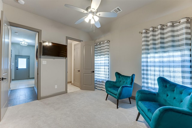 326 Prairie View Rd, Rockwall, TX 75087 - living area with carpet flooring, visible vents, baseboards, and a ceiling fan
