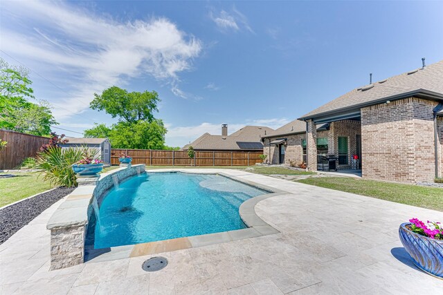 326 Prairie View Rd, Rockwall, TX 75087 - view of pool featuring a patio area, a fenced backyard, a fenced in pool, and a shed