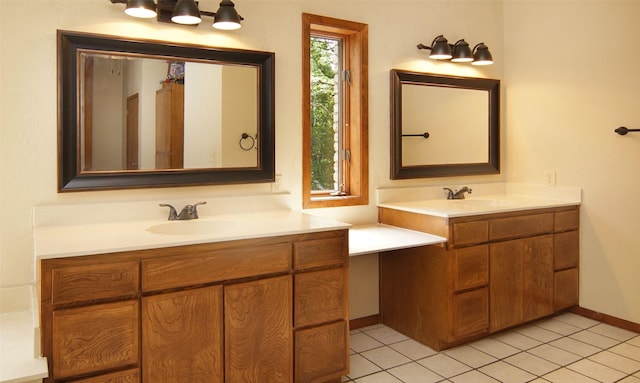 full bathroom with vanity and tile patterned floors