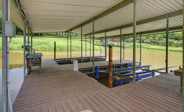 view of dock featuring a water view and boat lift