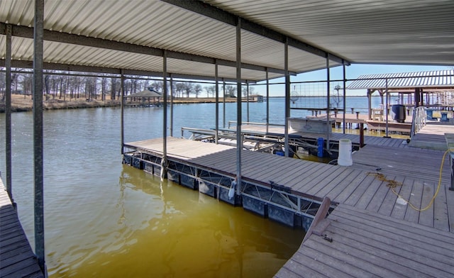 dock area featuring a water view