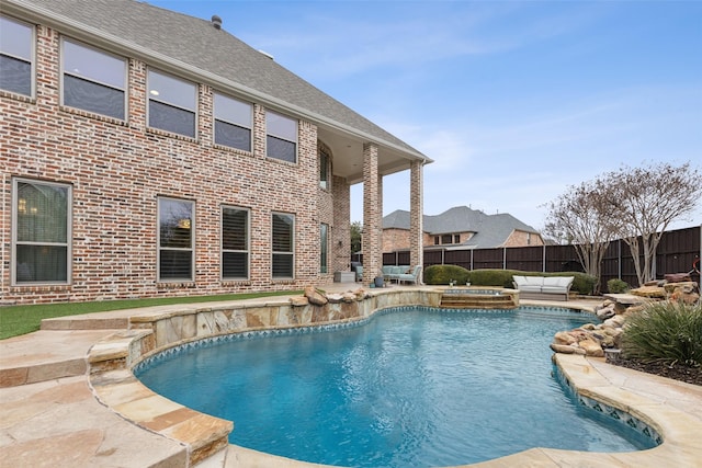 view of swimming pool featuring a patio area, a fenced backyard, and a fenced in pool