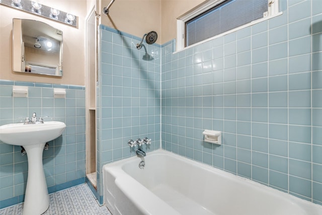 430 Mayrant Dr, Dallas, TX 75224 - full bath featuring tile walls, tile patterned flooring, and bathtub / shower combination