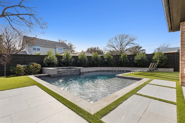 view of swimming pool featuring a patio area, a fenced backyard, and a yard