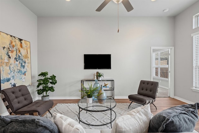 813 Louisville Rd, Aubrey, TX 76227 - living room with wood finished floors, baseboards, ceiling fan, recessed lighting, and a high ceiling
