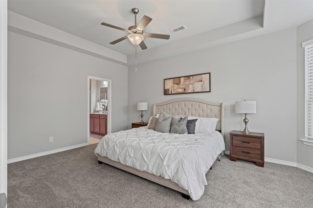 813 Louisville Rd, Aubrey, TX 76227 - bedroom with light carpet, baseboards, connected bathroom, and ceiling fan